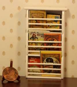 Miniature White Wall Shelf Filled with Childrens Books  