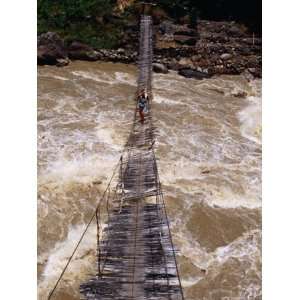 People Crossing Suspension Bridge Over Rapids of Ballem River, Bailum 