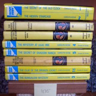 Up for sale are 9 Nancy Drew hardcovers by Carolyn Keene. The books 