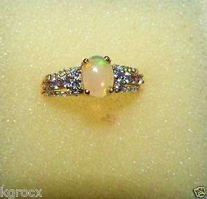 42 TCW 10KT AMAZING ETHIOPIAN OPAL, TANZANITE & DIAMOND RING SIZE 7 