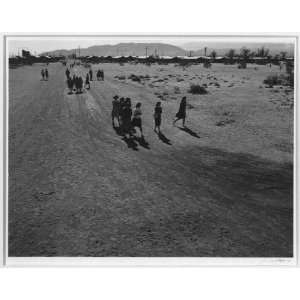  People walking,Manzanar Relocation Center / photograph by 