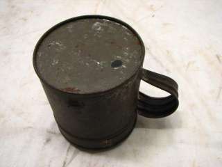 An antique tin sugar shaker. In overall good condition. Finish wear 