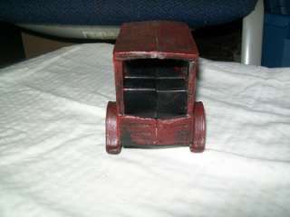 1920s? cast iron Model A Woody.Not sure if it is original or 