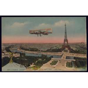  Paris,Aeroplane evoluant autour de la Tour Eiffel,c1910 