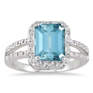  4.50 Carat Emerald Cut Blue Topaz and Diamond Ring in .925 