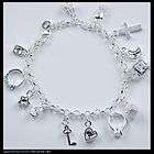 HTB80 silver Mixed pattern 13 charm bracelet