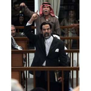 Former Iraqi President Saddam Hussein Berates the Court During their 