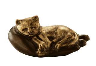 This cast iron gold finish cat on a hand paperweight makes a beautiful 